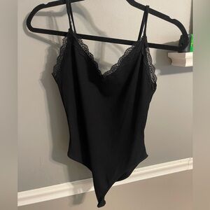 Simple black body suit with lace design